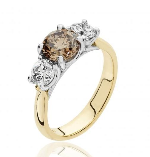 Brown-diamond three-stone ring by Saunders & Pughe
